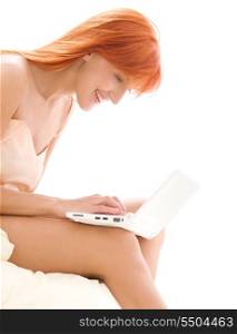 picture of happy redhead woman with laptop computer