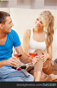 picture of happy romantic couple drinking wine
