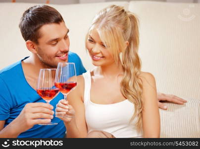 picture of happy romantic couple drinking wine