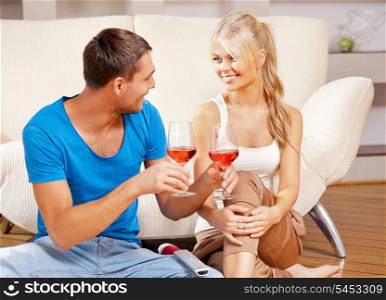 picture of happy romantic couple drinking wine