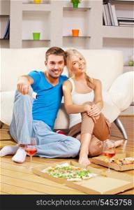 picture of happy romantic couple with remote