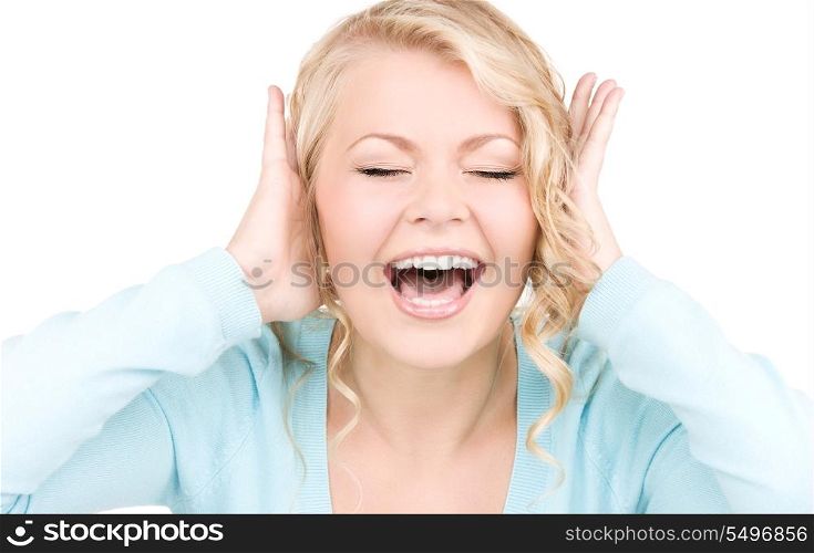 picture of happy screaming woman with hands over ears