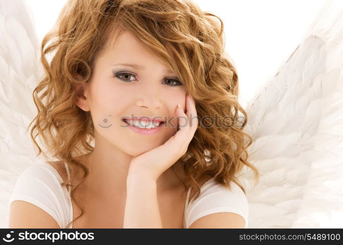 picture of happy teenage angel girl over white