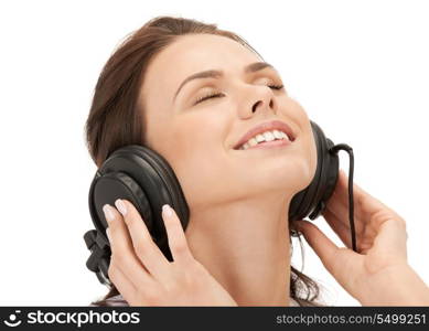 picture of happy teenage girl in big headphones