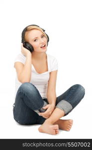 picture of happy teenage girl in big headphones