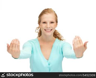 picture of happy teenage girl making inviting gesture