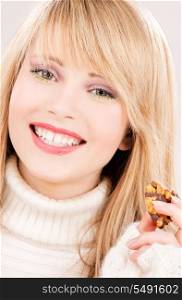 picture of happy teenage girl with cookie
