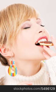 picture of happy teenage girl with cookie