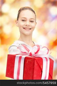 picture of happy teenage girl with gift box