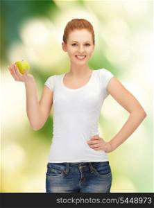 picture of happy teenage girl with green apple.