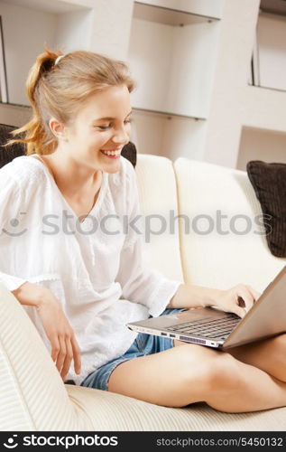 picture of happy teenage girl with laptop computer