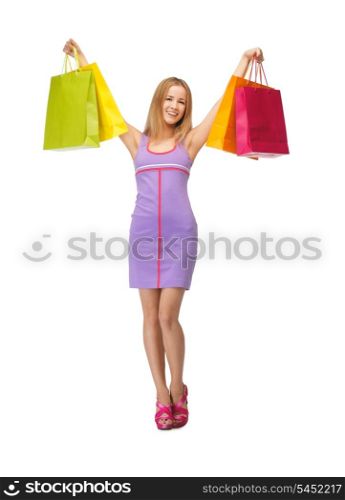 picture of happy teenage girl with shopping bags