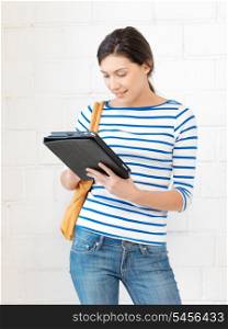 picture of happy teenage girl with tablet pc computer