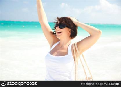 picture of happy woman at the beach