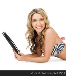 picture of happy woman in bikini with tablet pc computer