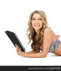 picture of happy woman in bikini with tablet pc computer