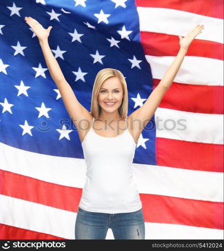 picture of happy woman in blank white t-shirt over american flag