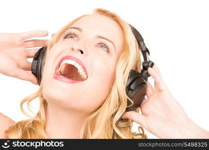 picture of happy woman in headphones over white