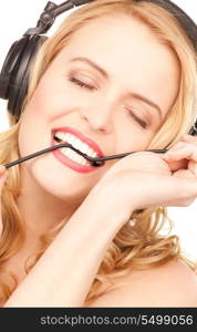 picture of happy woman in headphones over white