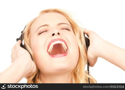 picture of happy woman in headphones over white