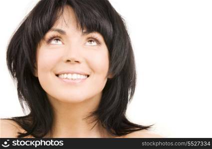 picture of happy woman looking up over white