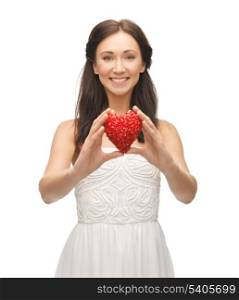 picture of happy woman showing heart shape