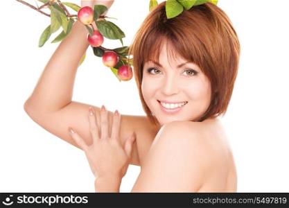 picture of happy woman with apple twig