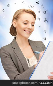 picture of happy woman with big notepad