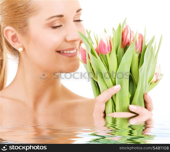 picture of happy woman with flowers over white