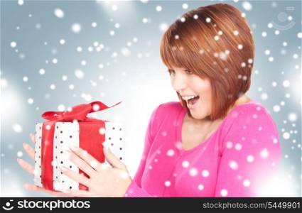 picture of happy woman with gift box.
