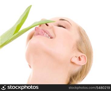 picture of happy woman with green leaf over white
