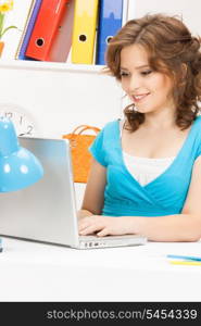 picture of happy woman with laptop computer