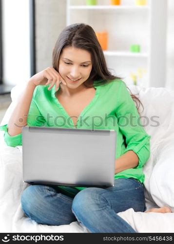 picture of happy woman with laptop computer