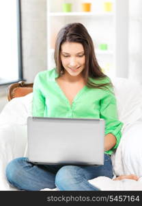 picture of happy woman with laptop computer