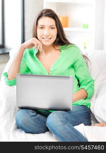 picture of happy woman with laptop computer