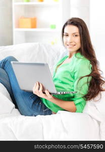 picture of happy woman with laptop computer