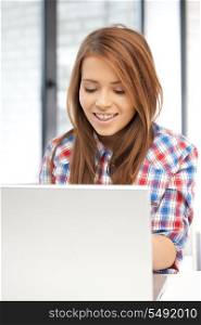 picture of happy woman with laptop computer