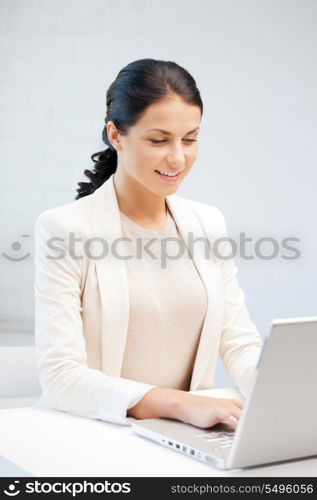 picture of happy woman with laptop computer