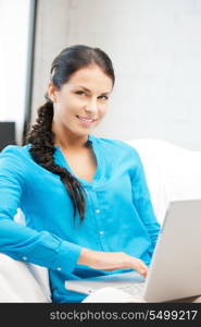 picture of happy woman with laptop computer