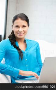 picture of happy woman with laptop computer.