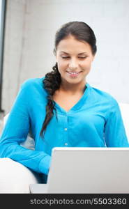 picture of happy woman with laptop computer.