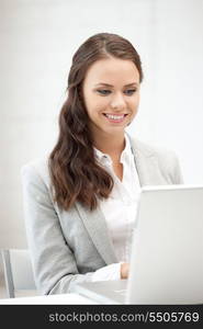 picture of happy woman with laptop computer