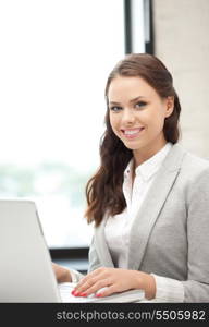 picture of happy woman with laptop computer