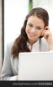 picture of happy woman with laptop computer