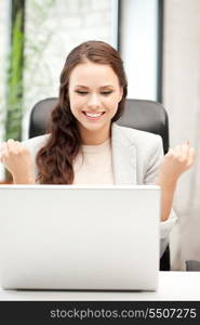 picture of happy woman with laptop computer