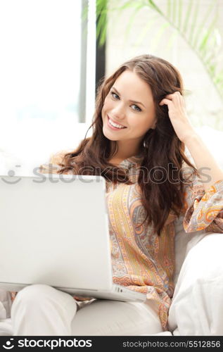 picture of happy woman with laptop computer