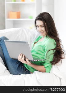 picture of happy woman with laptop computer