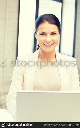 picture of happy woman with laptop computer. happy woman with laptop computer