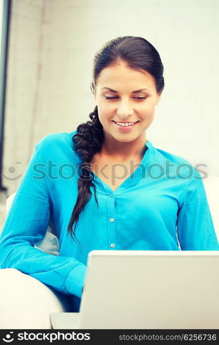 picture of happy woman with laptop computer.. happy woman with laptop computer