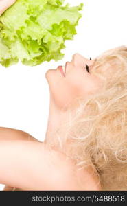 picture of happy woman with lettuce over white